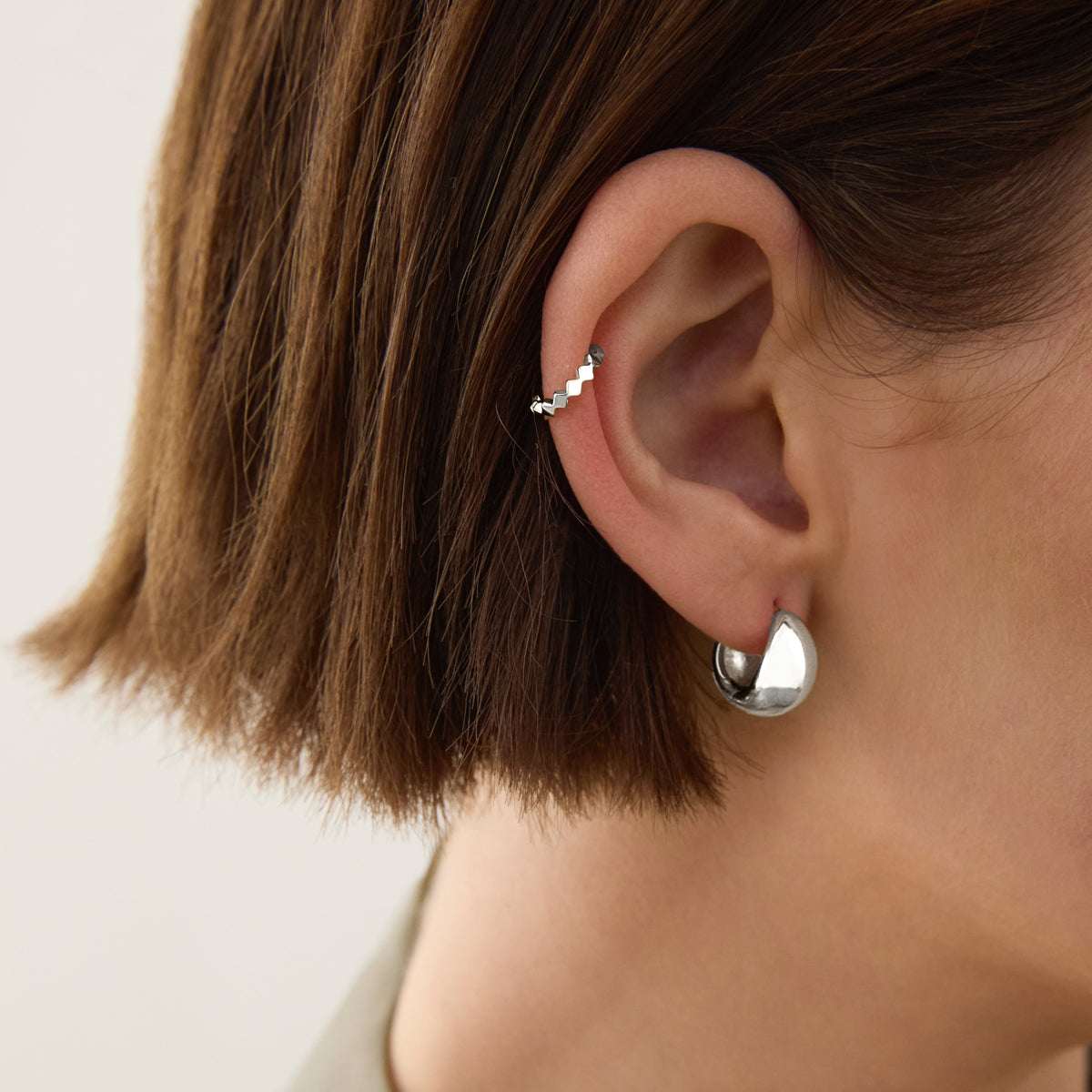 Najo La Muse Huggie Earrings - Silver